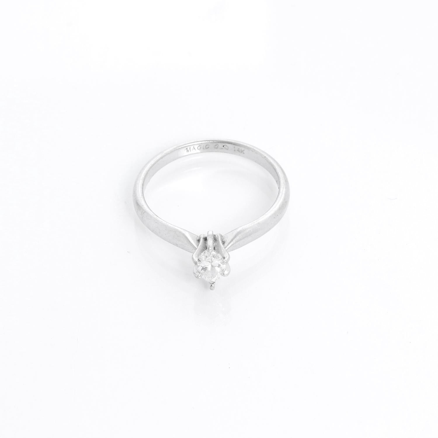 14K White Gold Marquise Magic Glo Kay Engagement Ring Size 7  - 14k white gold Marquise diamond engagement ring.  Size 7. Can be sized. Measuring .26 carats.  Grade H. Clarity VS2.  MAGIC GLOW. Pre-owned with custom box.