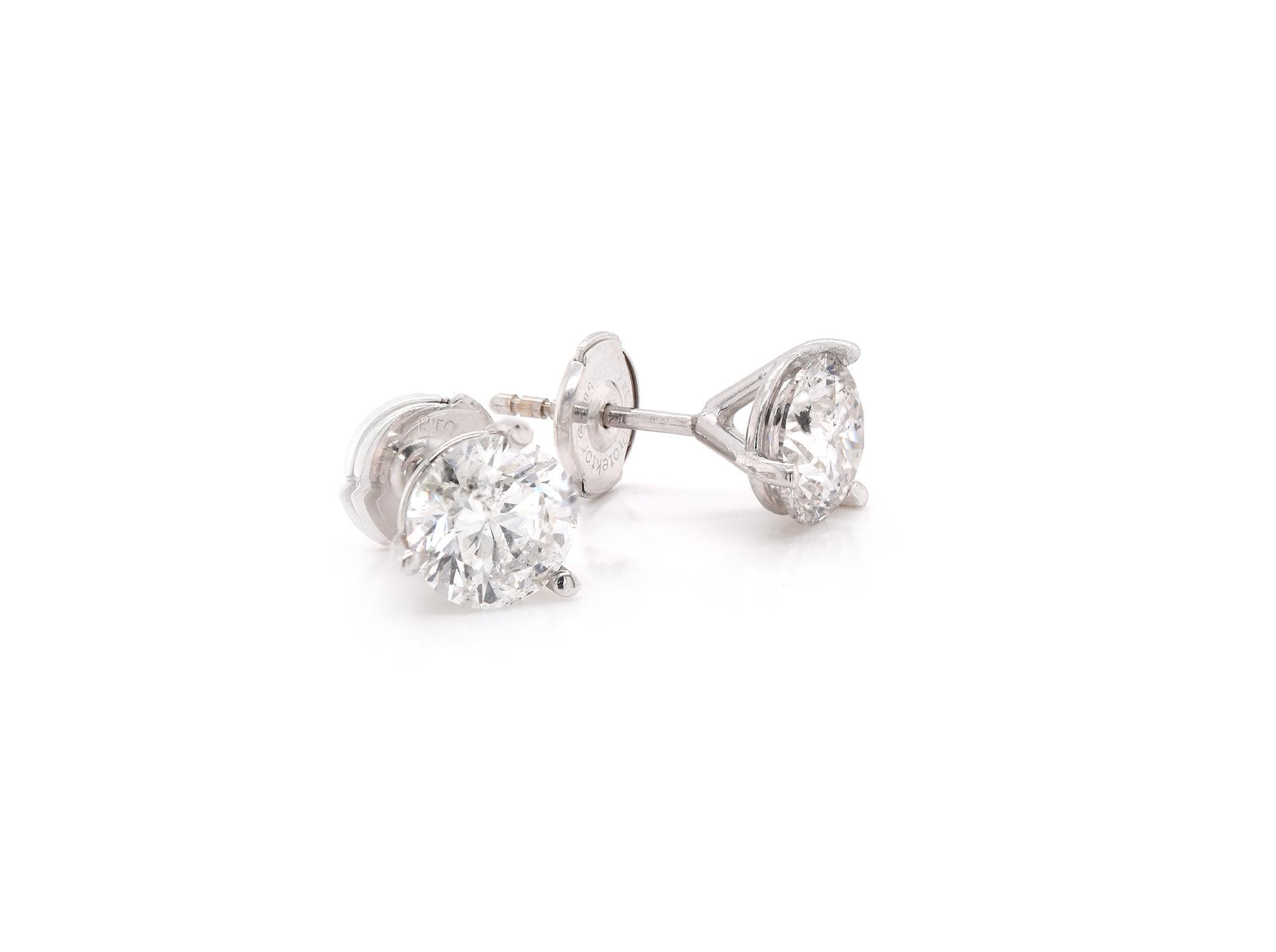 Designer: custom 
Material: 14k white gold
Diamonds: 2 round brilliant cuts= 2.49 cttw 
Color: H-I
Clarity: SI3-I1
Dimensions: earrings measure 7.65mm in width and 15.88mm in length
Fastenings: friction back with posts
Weight: 1.8 grams
