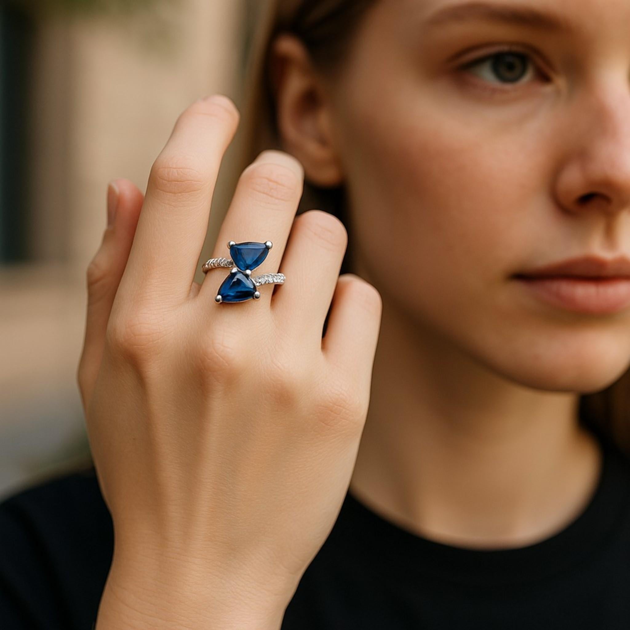 Modern 14K White Gold Matched 2 Pear-Shaped Sapphire and Diamond Cross Ring For Sale