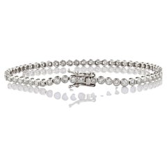 Bracelet de tennis en or blanc 14K serti d'un chaton de diamants