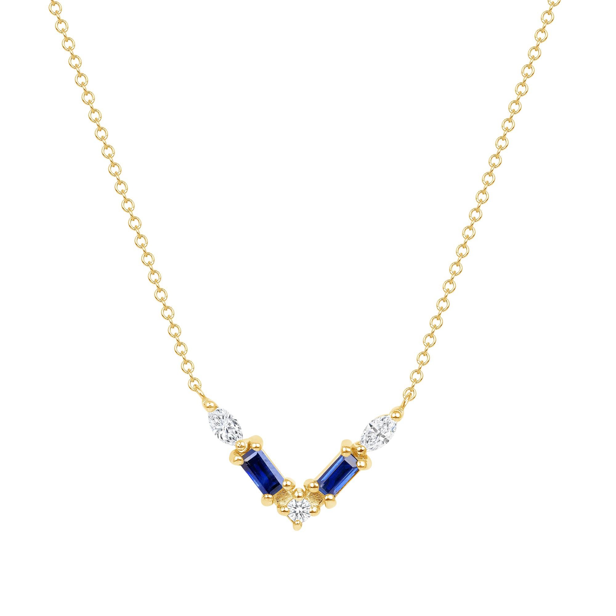 Diese aus 14-karätigem Gold gefertigte Halskette zeichnet sich durch eine durchdachte Anordnung von blauen Saphiren und Diamantenpavé aus, die elegant entlang einer V-förmigen Ebene angeordnet sind. Der aus 14-karätigem Weißgold gefertigte Schmuck