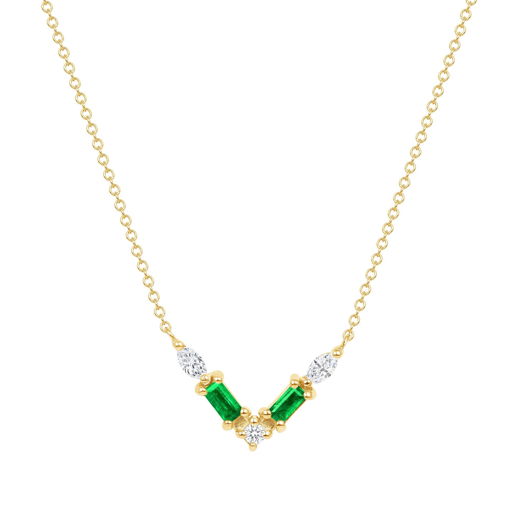 Crafted in 14K gold, this necklace features a thoughtfully arranged collection of emerald and diamond pavé, elegantly set along a V-shaped plane. Crafted in 14K white gold, it exudes delicacy and emotion, showcasing a captivating color palette.