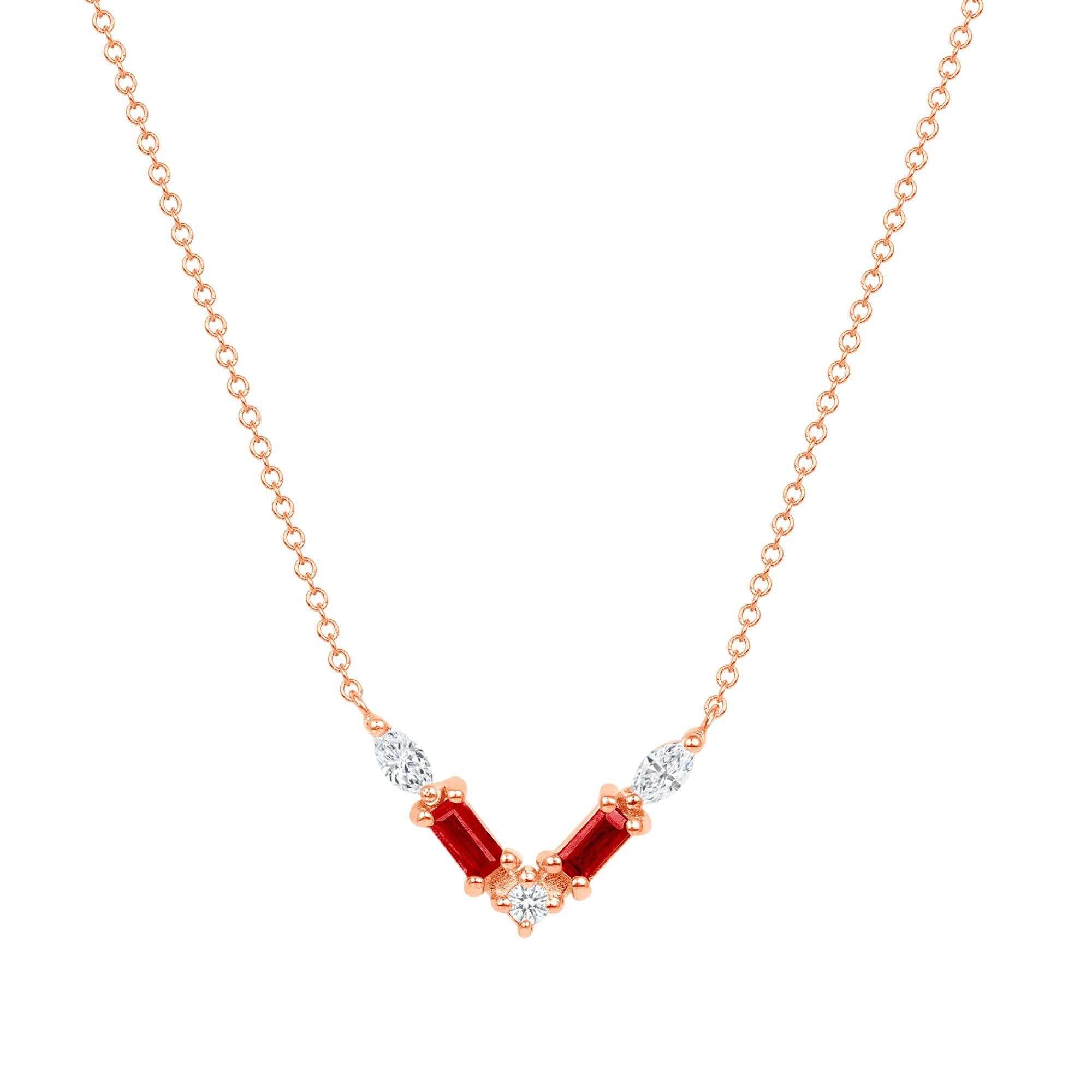 Crafted in 14K gold, this necklace features a thoughtfully arranged collection of ruby gemstones and diamond pavé, elegantly set along a V-shaped plane. Crafted in 14K white gold, it exudes delicacy and emotion, showcasing a captivating color