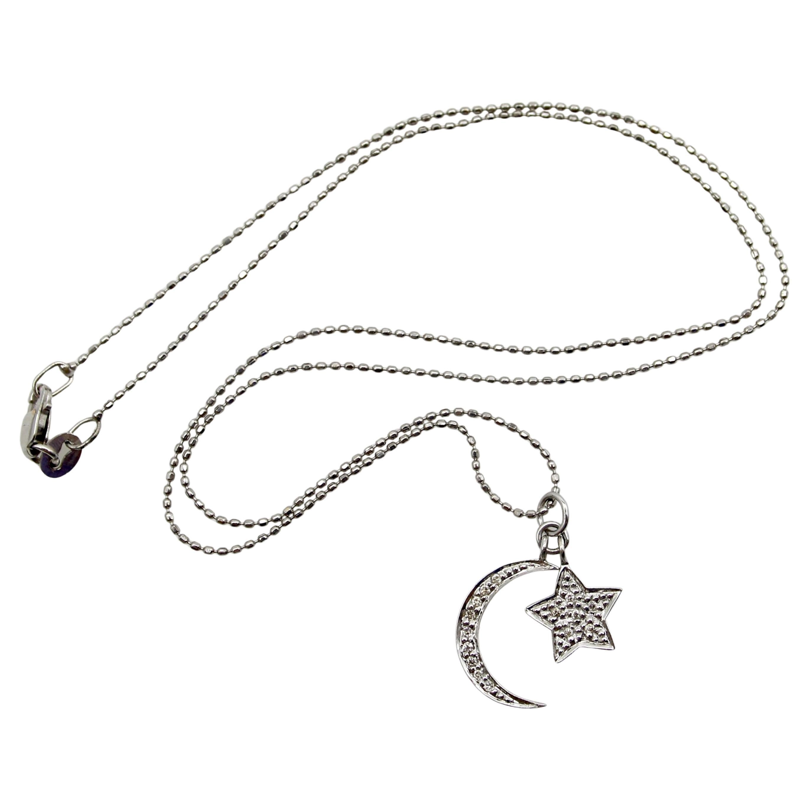 Collana di diamanti con luna e stella in oro bianco 14K