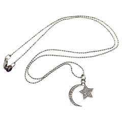 Collana di diamanti con luna e stella in oro bianco 14K
