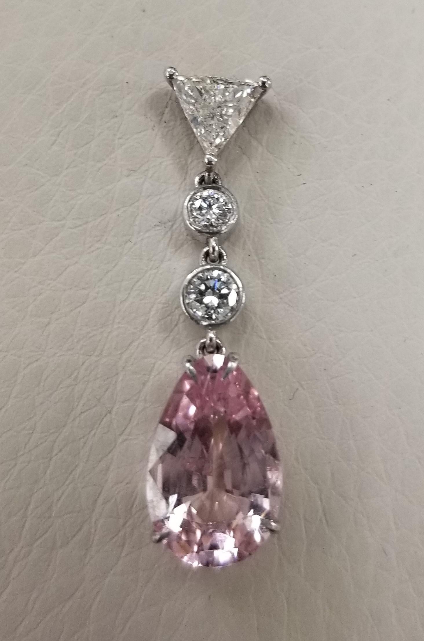 14k white gold Morganite and diamond ear drops, containing 2 pear shape cut Morganite of gem quality weighing 5.03cts. with 2 triangle cut diamonds; color 