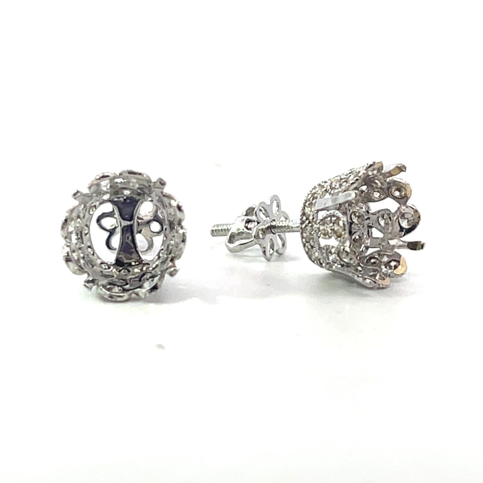 14k White Gold Weight 1.8g 
Mounted Stud Earrings Measurements 0.35mm x 0.35in With Diamond detail on the sides.