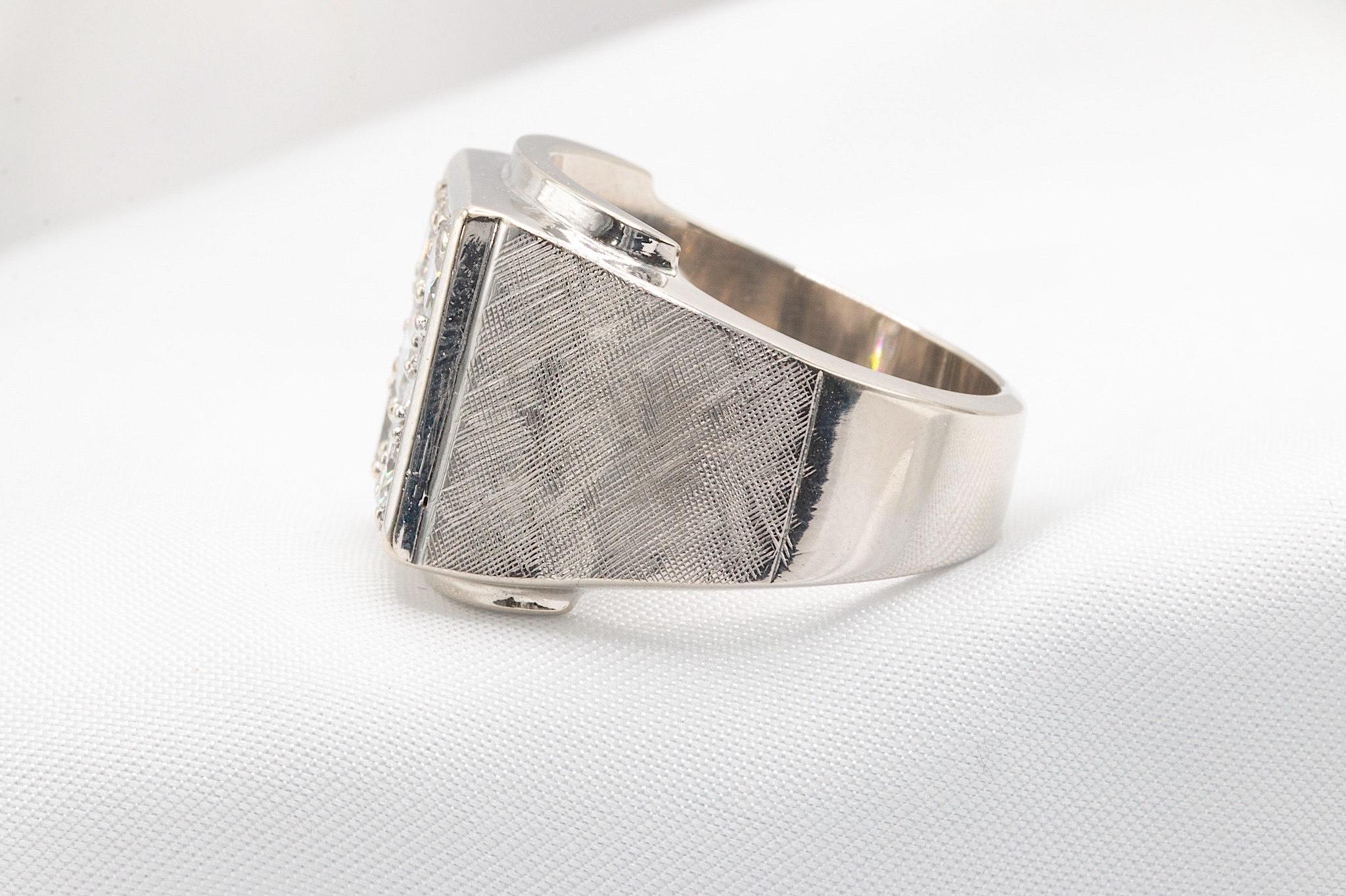 Stunning Multi-Diamond Ring in 14K White Gold  
This eye-catching ring features approximately 2-2.25 carats total weight of sparkling round diamonds, with a center diamond of about 0.60 carats (I-J color, VS clarity). Weighing in at 17.2 grams, this