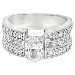 Or blanc 14K Diamant multi-taille 1.20 ct centre ovale