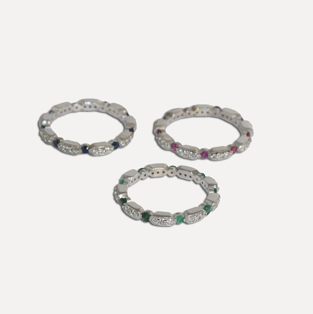 14k white gold gemstone, stackable rings.
The gold tests 56.5% with an XRF metal analyzer.
There are about .50 total carats of diamonds and .50 total carats of natural emeralds, rubies and blue sapphires.
The ring size is 6.
Excellent condition.