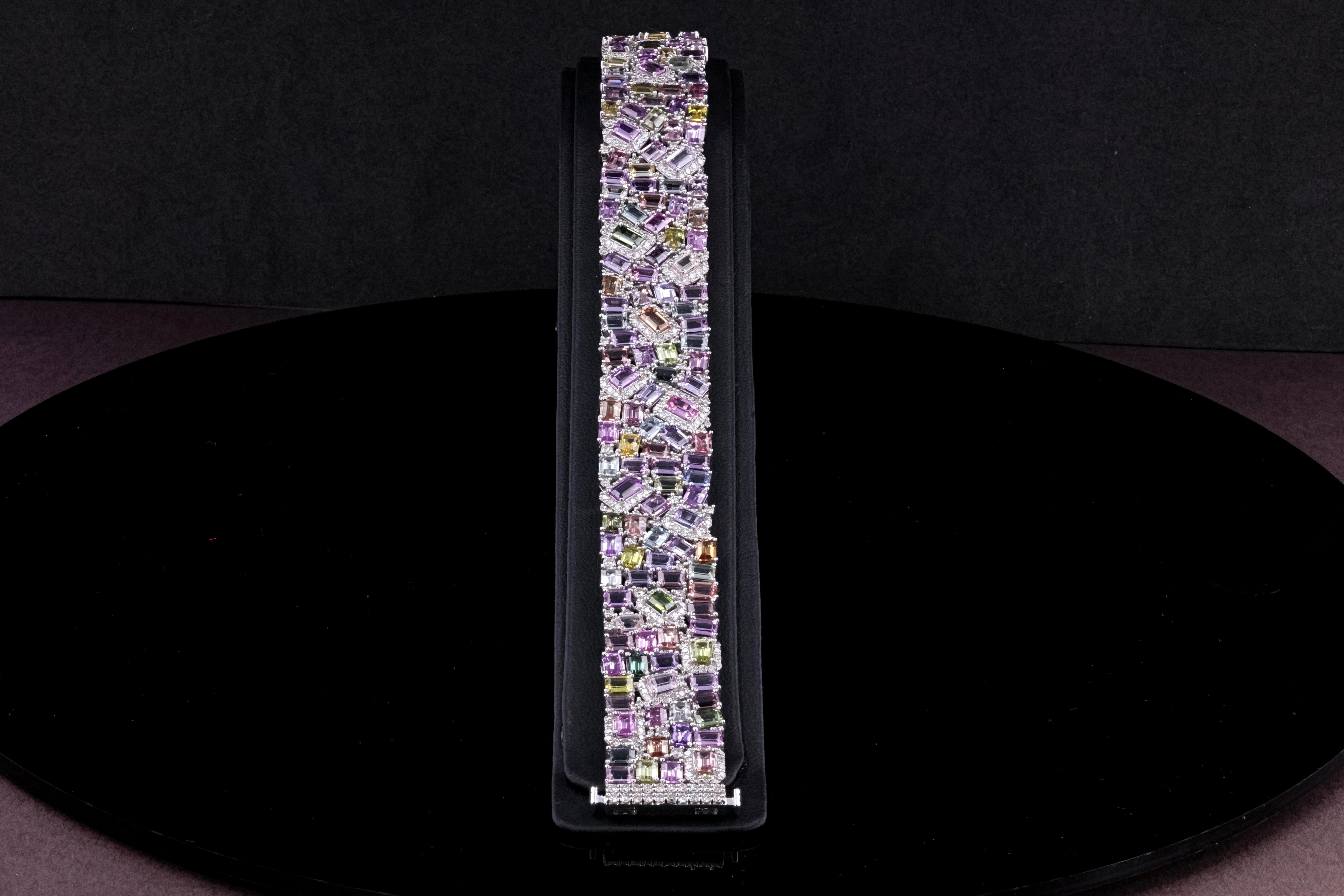 Showcasing a beautiful all natural beautiful multicolor sapphire necklace. This is a staple piece in anyone's jewelry collection. It was carefully handmade in Los Angeles California and polished in 14k white gold. The bracelet features a very unique