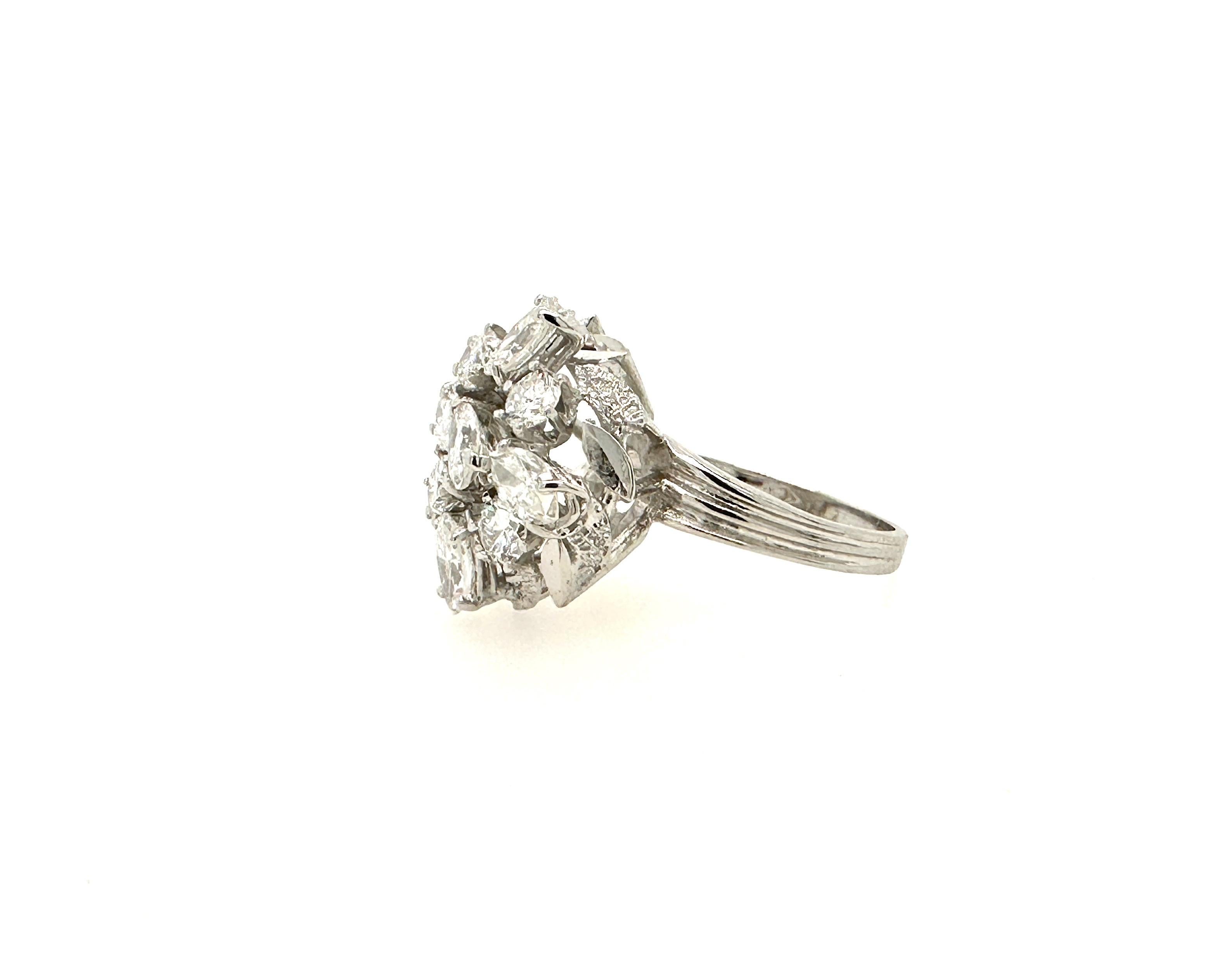 This beautiful cocktail ring is made with 3 different shapes of diamonds : Marquise, Pear and Rounds.
All diamonds are D-F in color and VS1 in clarity.
Perfect for everyday use or for a special occasion,