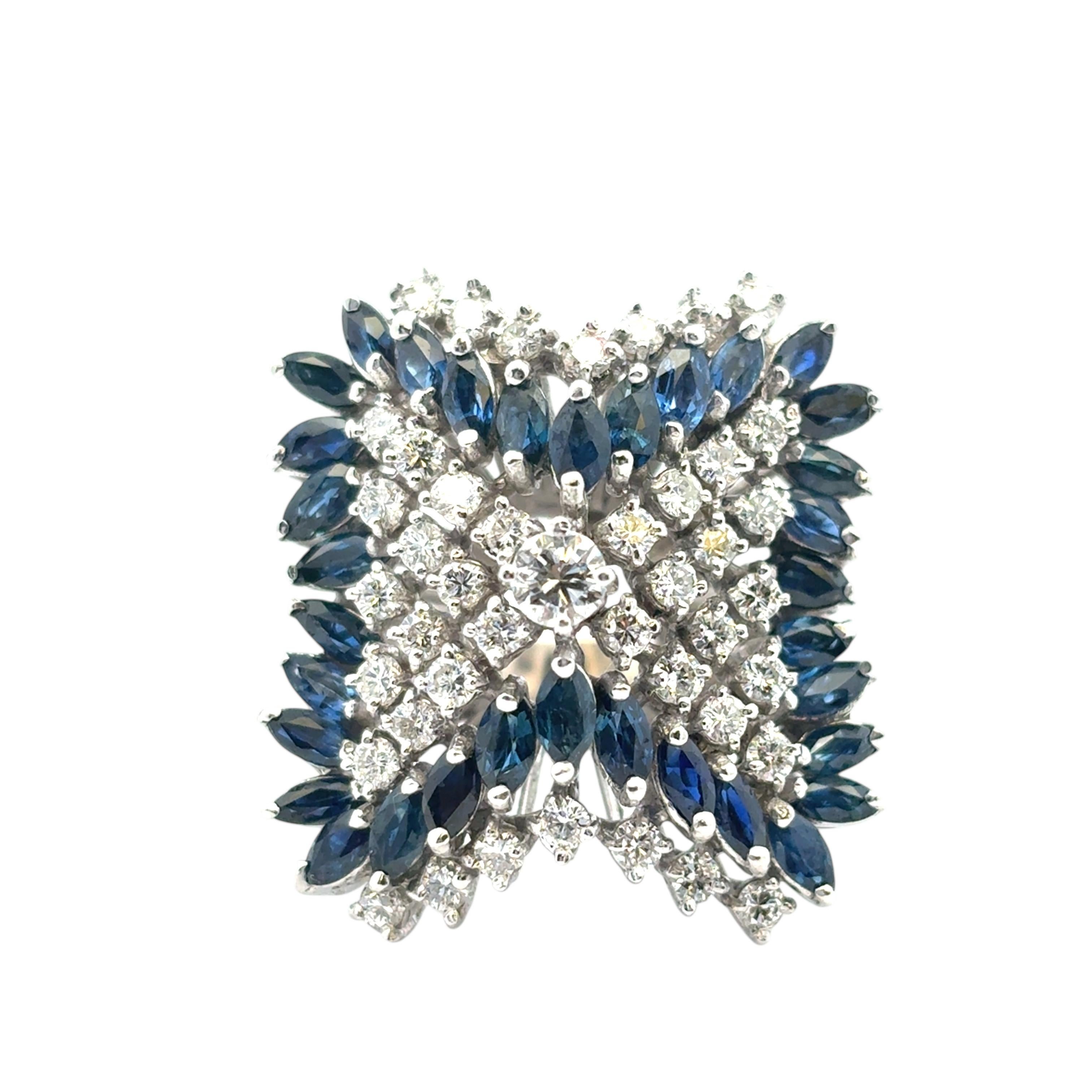 14k White Gold Natural Diamond and Blue Sapphire Cocktail Ring

This stunning Sapphire Diamond Cocktail Ring is in excellent condition and is ready to ship!

Style: Cocktail Ring
Material: 14k White Gold
Gemstone Details: This ring features