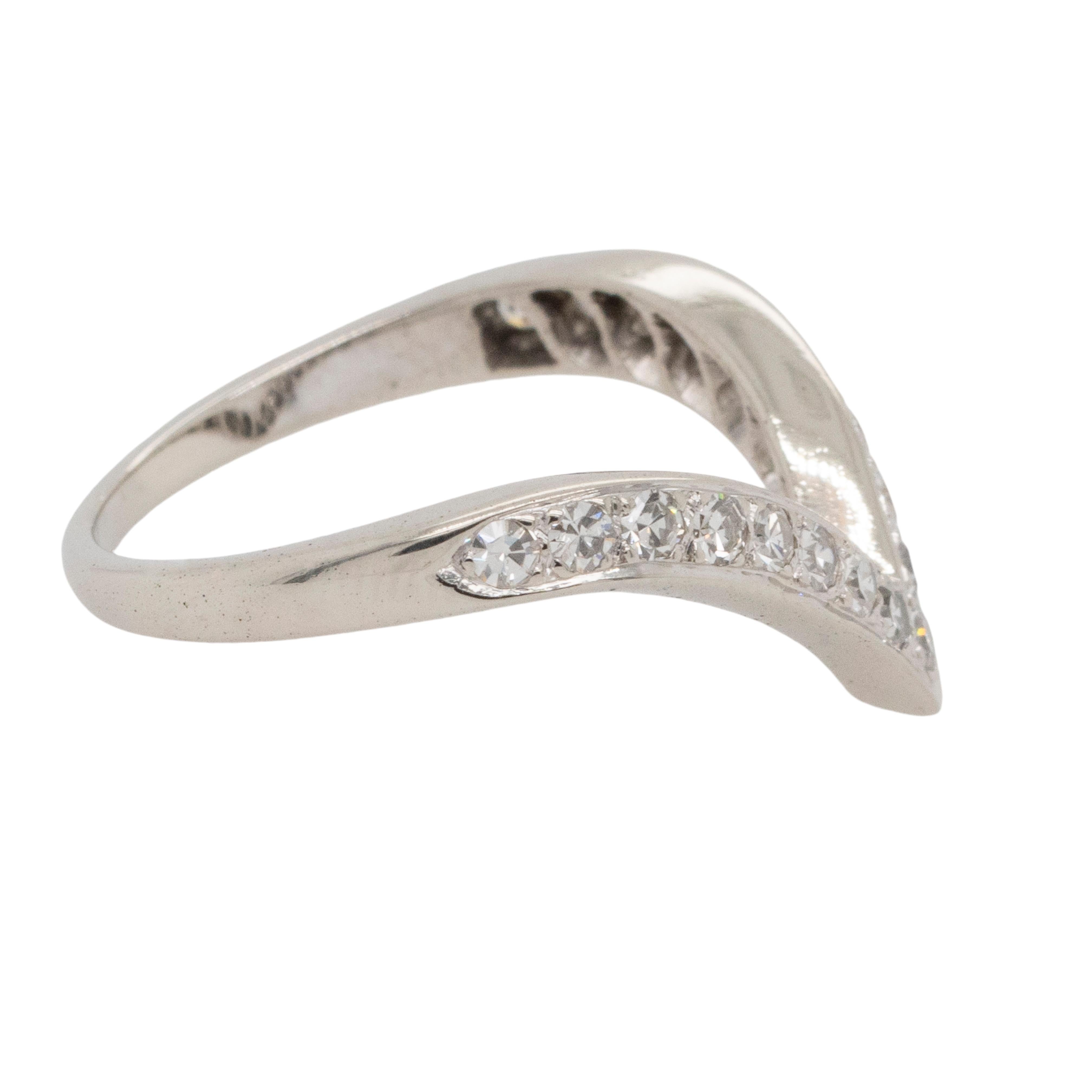 This 14k White Gold V-Shaped Ring features approximately 0.26ctw of natural round brilliant diamonds, elegantly set in a sleek and modern 