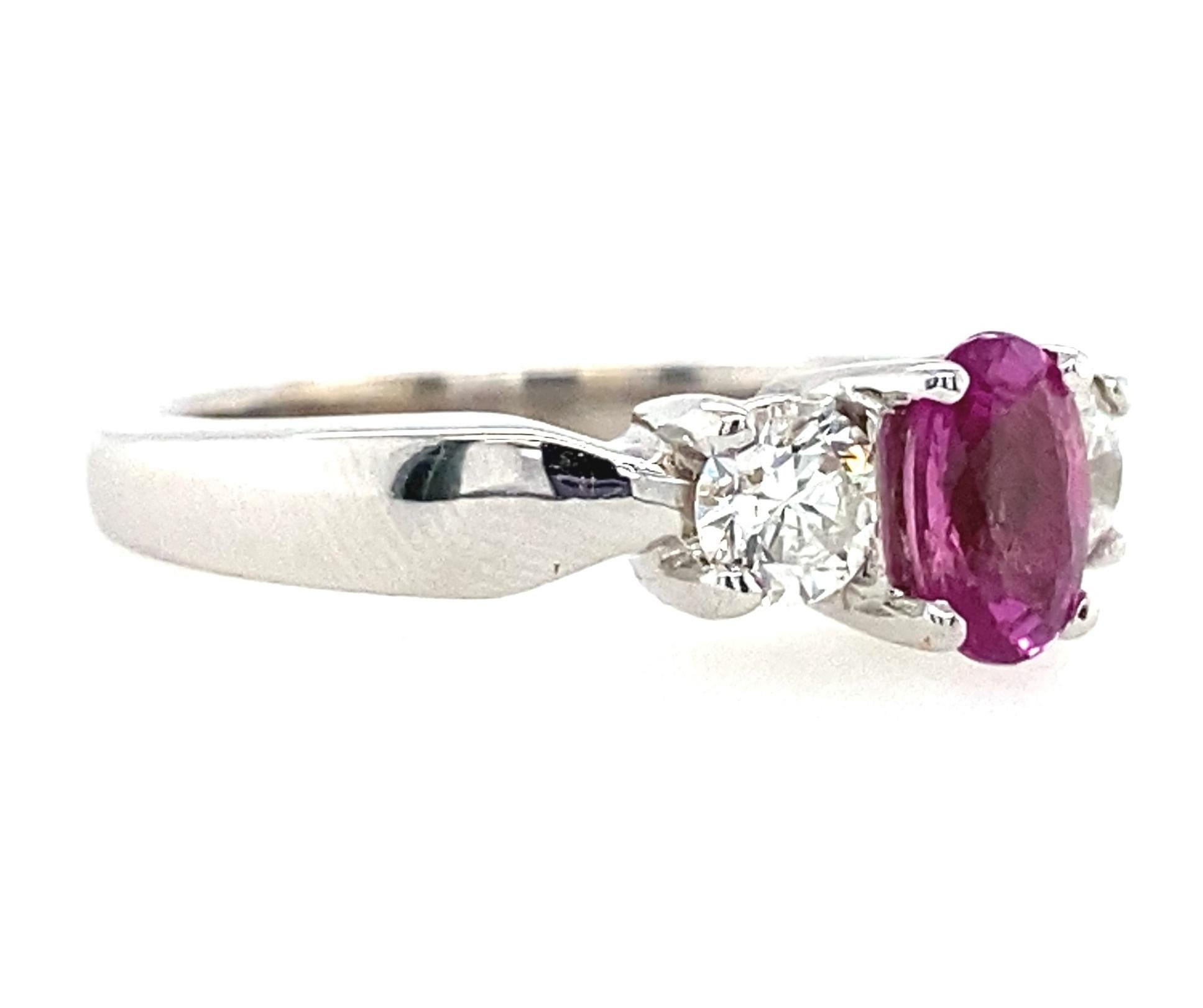 This ring features a .86ct deeply saturated natural pink sapphire nestled into .55TCW of the most sparkly diamonds you could ask for. Low lighting, direct sun lighting, it doesn't matter--these diamonds are here to party! They are G-H in color and