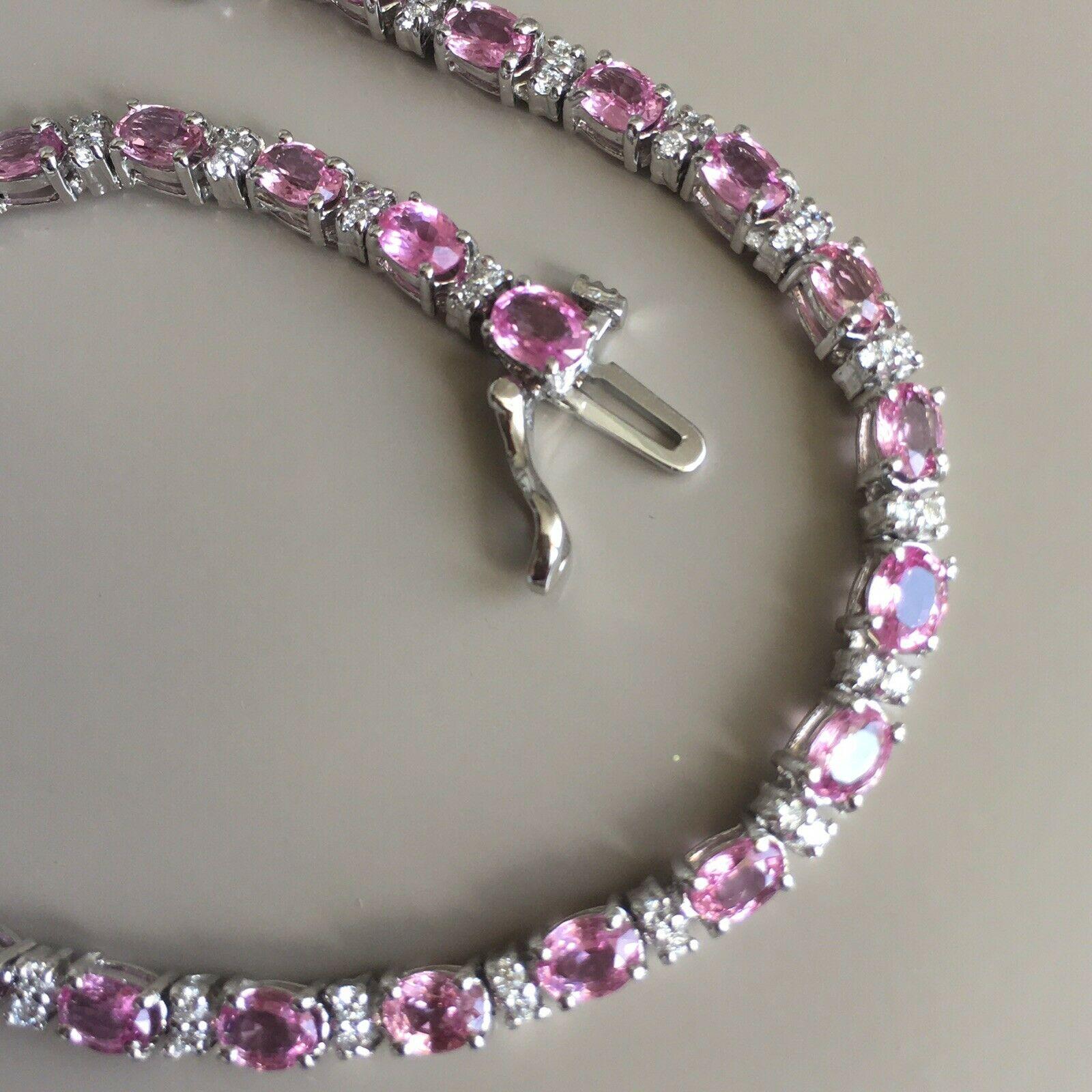 14K White Gold Natural Pink Sapphire & Diamond Double Wire Bracelet, Brand New. 

30 pieces of 2 mm by 4 mm Oval cut matching natural vivid color Pink Sapphires 6.6 Carat total weight and 60 pieces of round cut Diamonds Total Weight of Diamonds .50