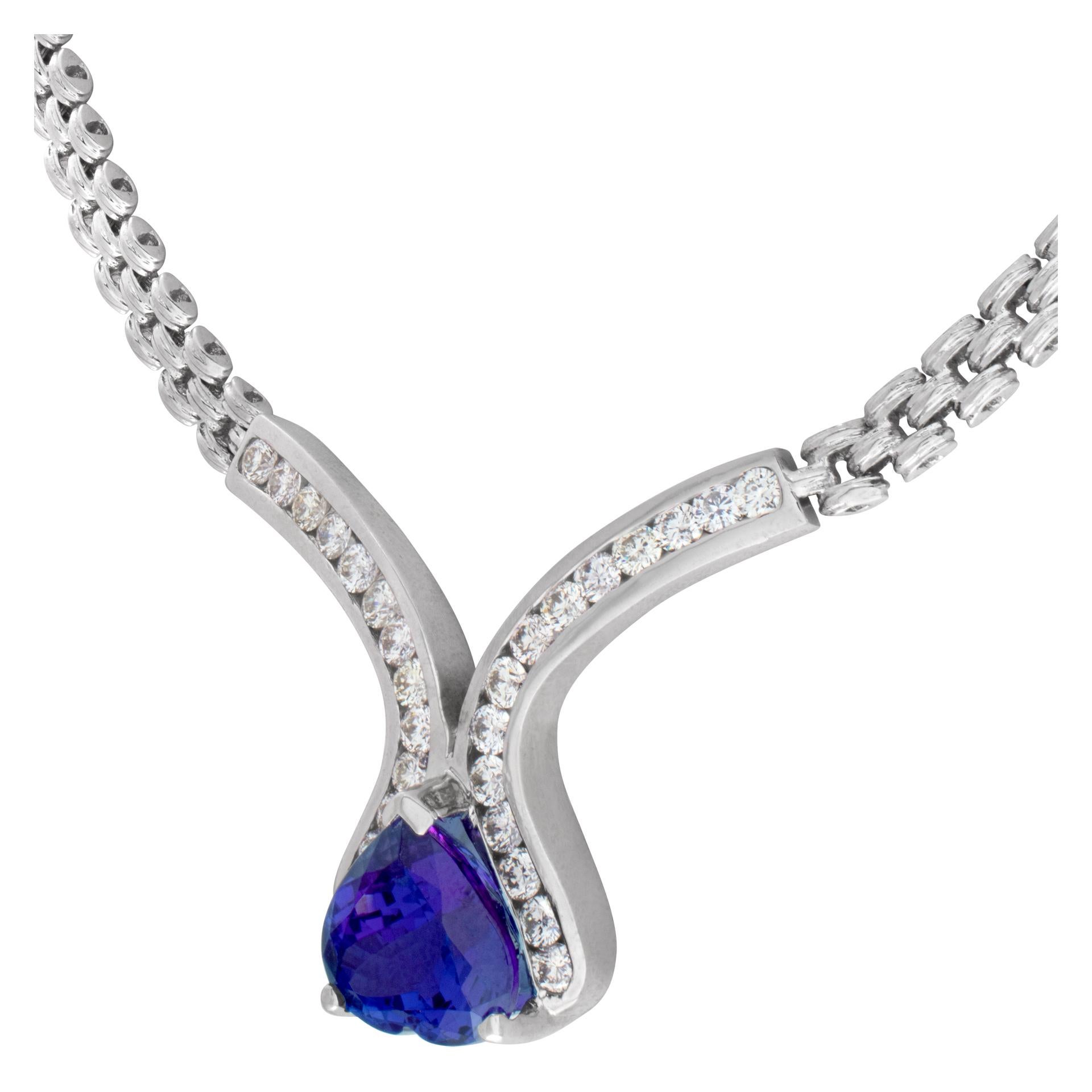Women's 14k White Gold Necklace with a 13.15 Carat Heart Shape Tanzanite Surrounded For Sale