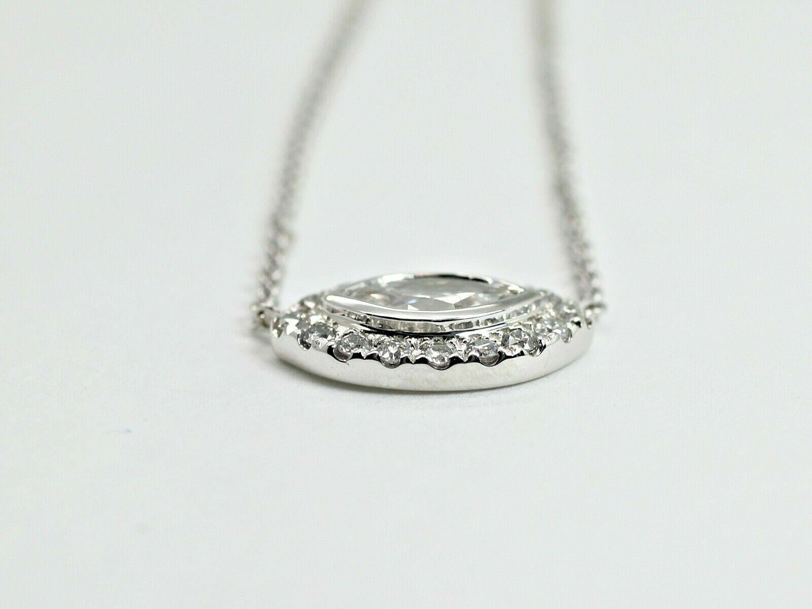Marquise Cut 14 Karat White Gold Necklace with a Marquise and Halo For Sale