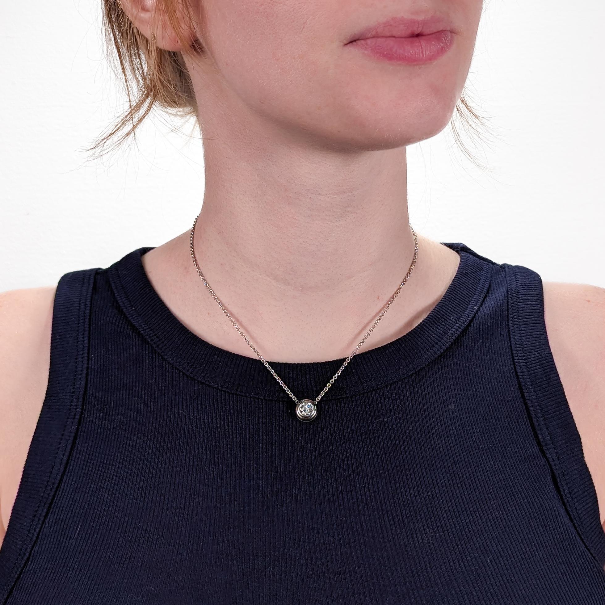 A fine retro diamond solitaire necklace.

In 14k white gold together with a 14k white gold chain.

With a circa 1.09 ct Old European cut diamond (color: G-H, clarity: VS1). 

Accompanied by a GEMLAB (Gemological Appraisal Laboratory) report.

Simply