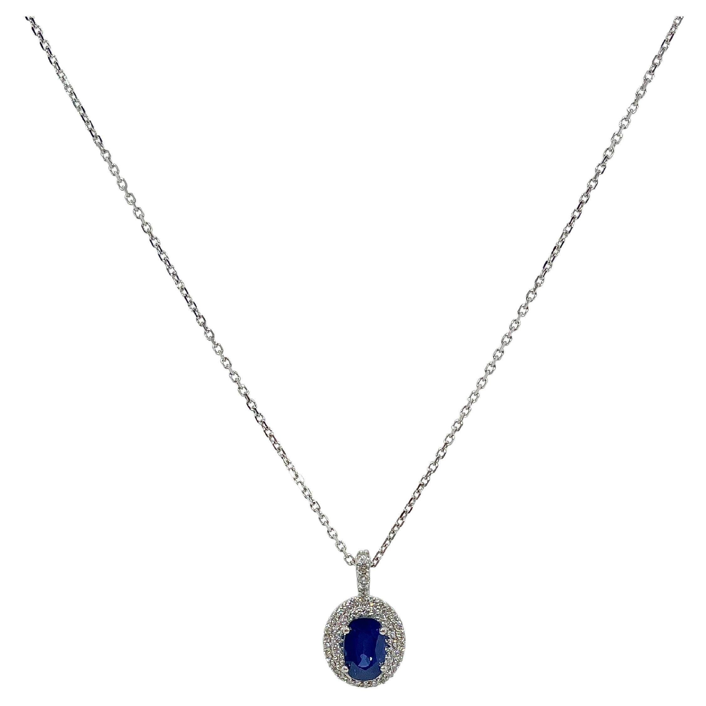 14K White Gold Oval 2 CT Sapphire and .75 CTW Diamond Halo Pendant Necklace