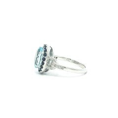 14k White Gold Oval Aquamarine w/ Sapphire Halo & Diamond Buckle Sides Ring