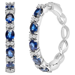 14K White Gold Oval Blue Sapphire and 1/4 Cttw Diamond Alternating Hoop Earring