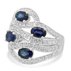 14K White Gold Oval Blue Sapphire and Round Diamond Wave Ring