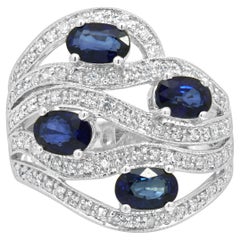 14K White Gold Oval Blue Sapphire and Round Diamond Wave Ring