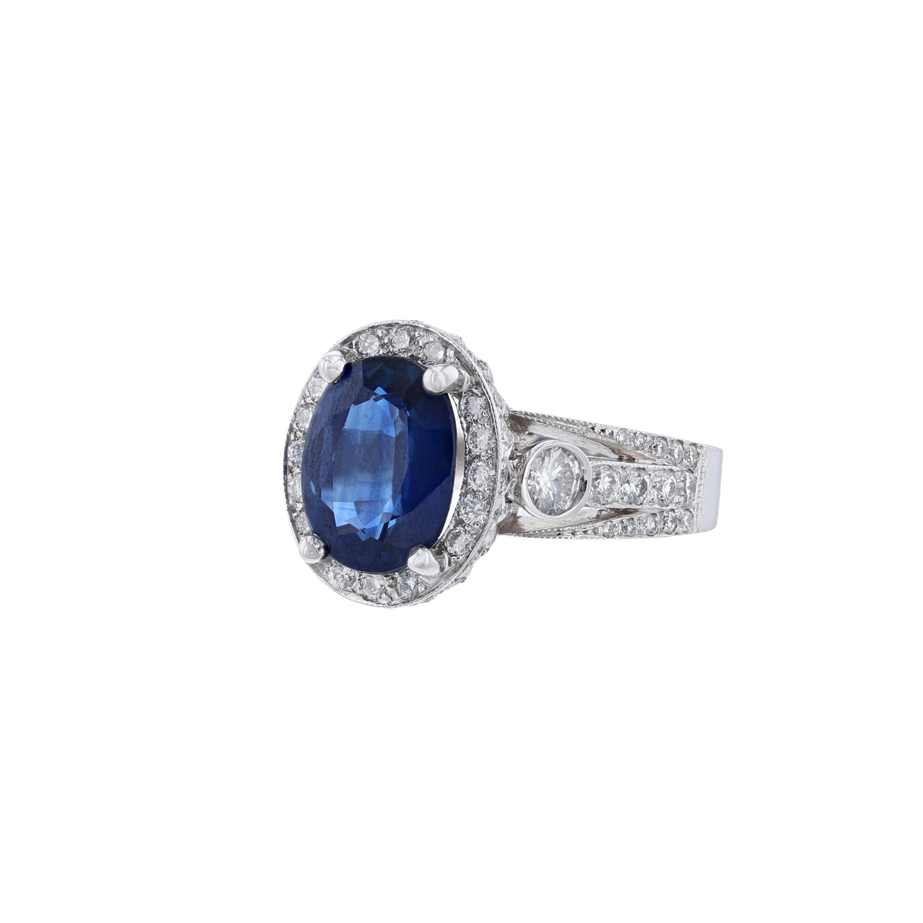 Modern 14K White Gold Oval Blue Sapphire Diamond Ring For Sale