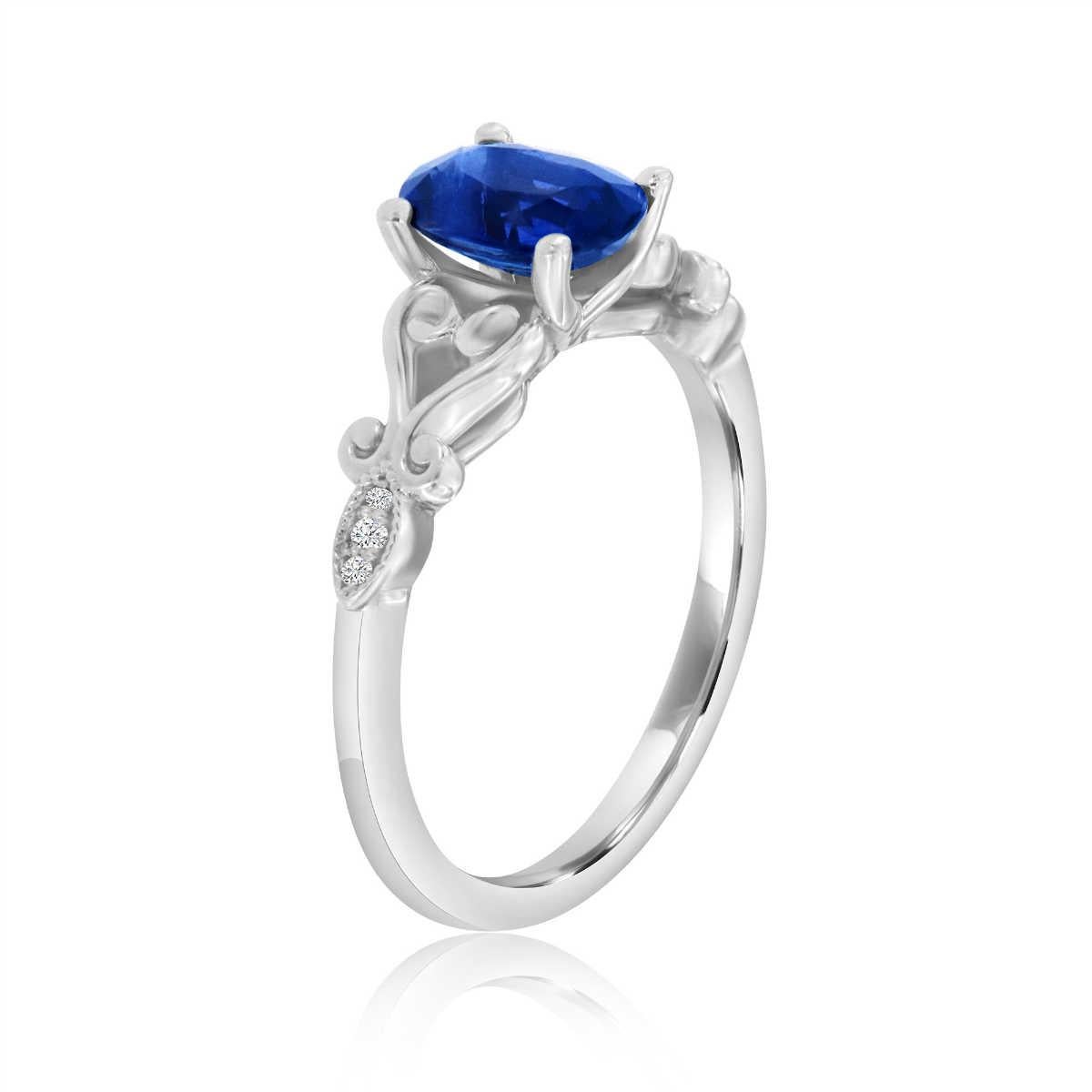 This Ring features a 1.48 Carat oval shaped Sapphire four-prong set. A delicate heart design above a marquise shape milgrain with diamonds adds a vintage look to this elegant Ring. Experience the difference in person!

Product details: 

Center
