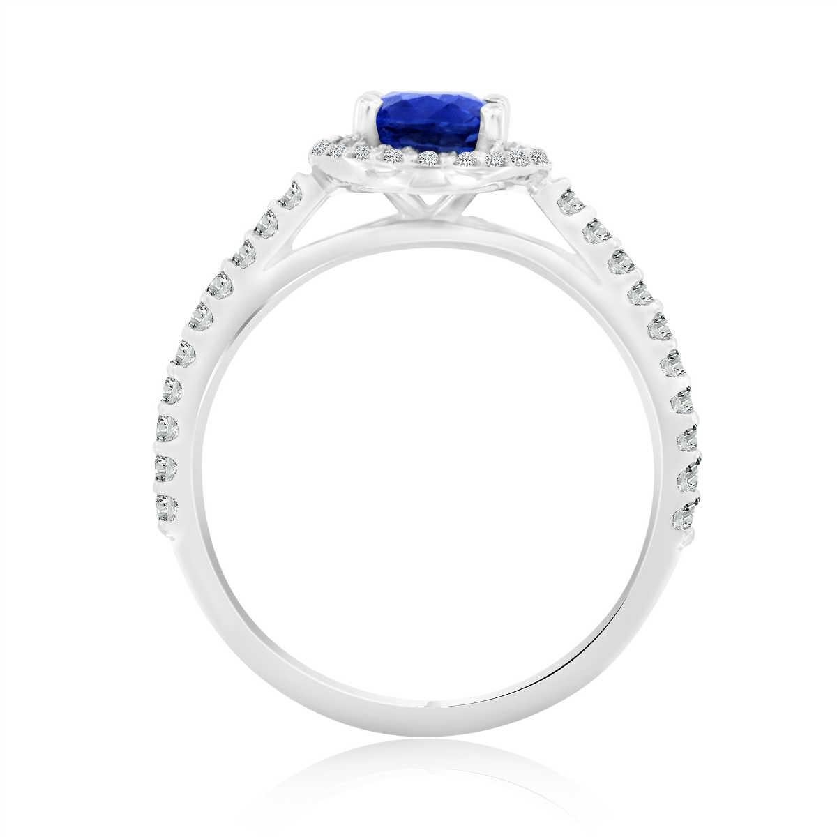 This delicate ring features a 1.46-carat Oval shape Sri Lankan Blue Sapphire encircled by a halo of round melee diamonds. A scalloped micro-prong diamonds on the shank adds a dazzling effect. Experience the difference in person!

Product details: