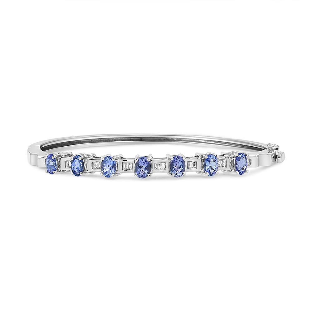 Contemporaneo Bracciale in oro bianco 14K con tanzanite blu ovale e diamante da 1/4 di carato in vendita