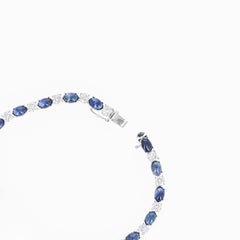 Bracelet en or blanc 14 carats avec saphirs cabochons ovales et diamants ronds