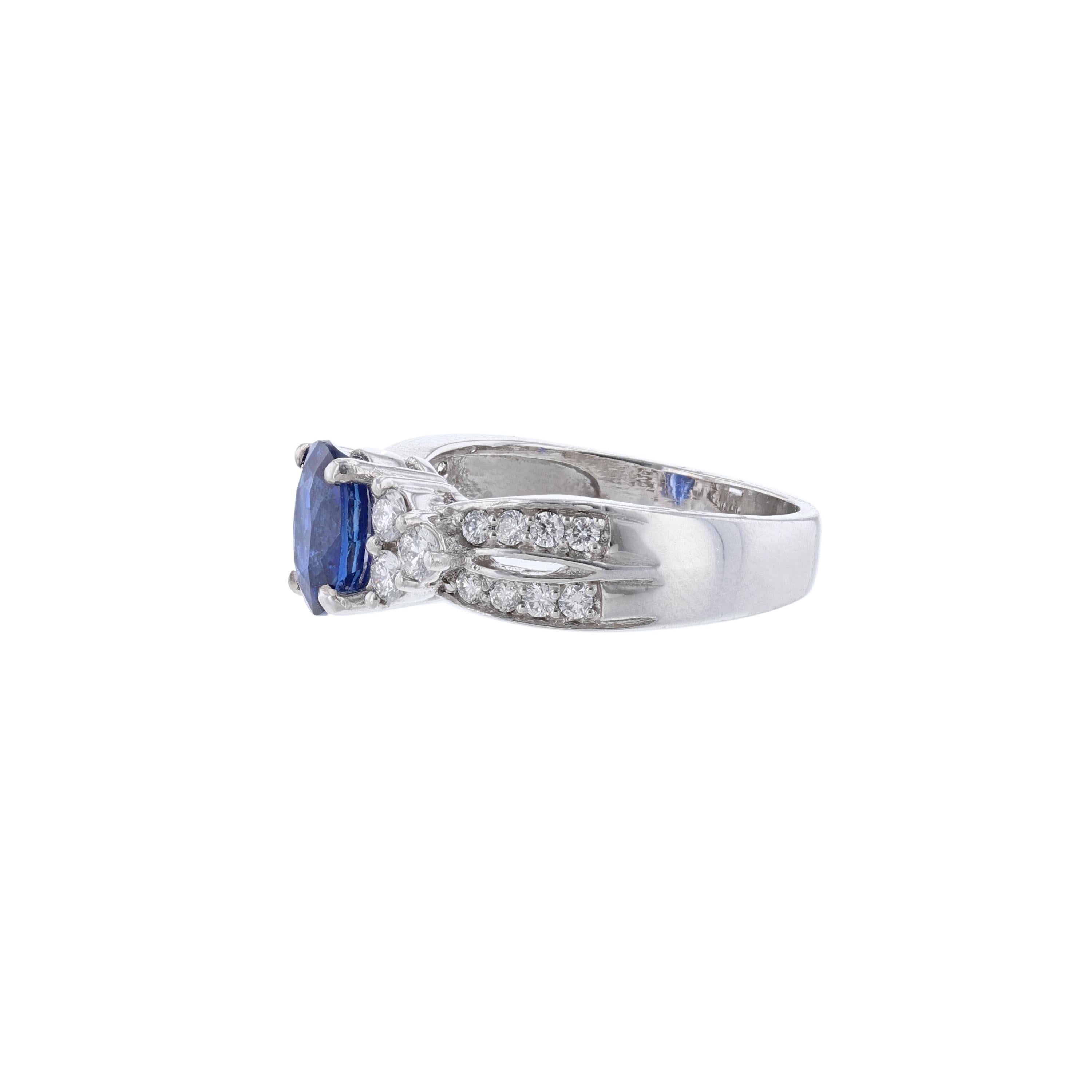 Contemporary 14K White Gold Oval Cut Blue Sapphire and Diamond Ring For Sale