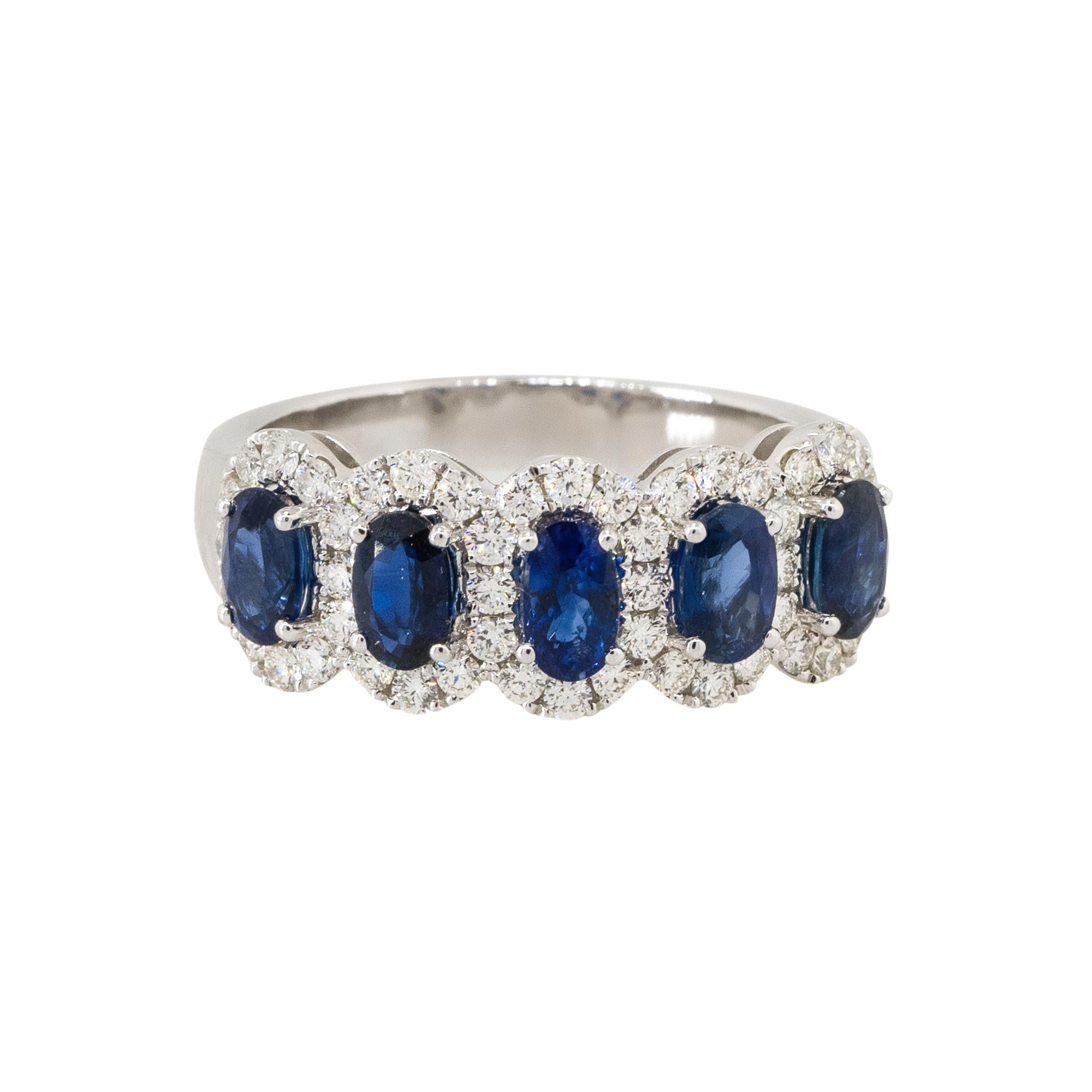 Material: 14k White Gold
Diamond Details: Approx. 0.57ctw of round cut Diamonds. Diamonds are G/H in color and VS in clarity
Gemstone Details: Approx 1.77ctw of oval cut Sapphire gemstones. 5 stones total
Ring Size: 6.25 
Total Weight: 5.3g