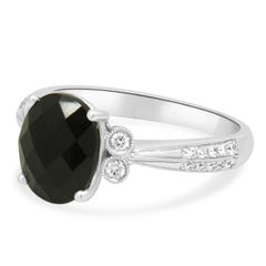 14K White Gold Oval Faceted Onyx and Round Diamond Ring