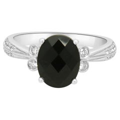 14K White Gold Oval Faceted Onyx and Round Diamond Ring