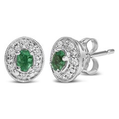 14K White Gold Oval Green Emerald and 1/10 Cttw Diamond Halo Stud Earrings