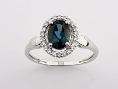 14K White Gold Oval London Blue Topaz and Diamond Halo Ring
