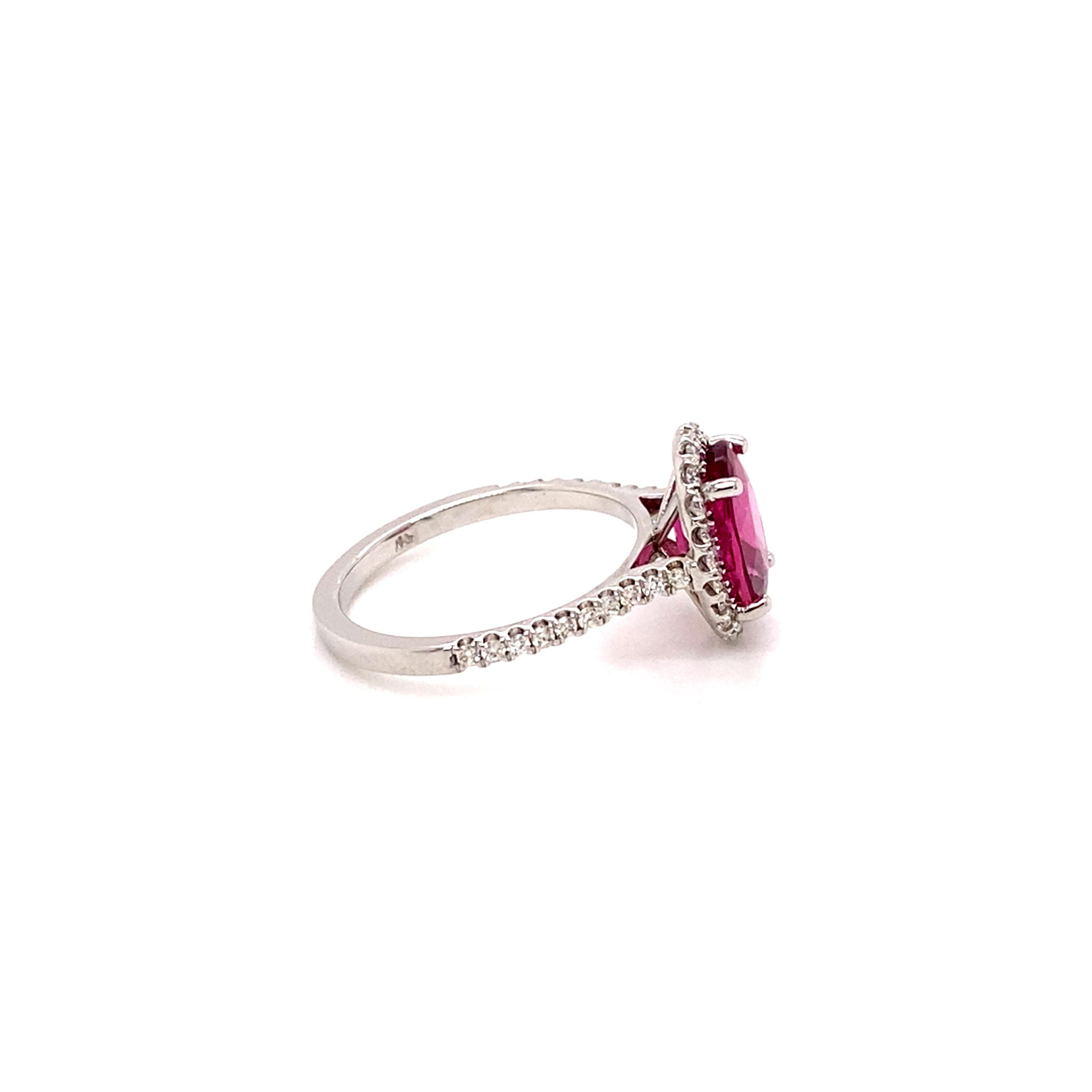 Contemporary 14 Karat White Gold Oval Pink Tourmaline Diamond Halo Ring For Sale