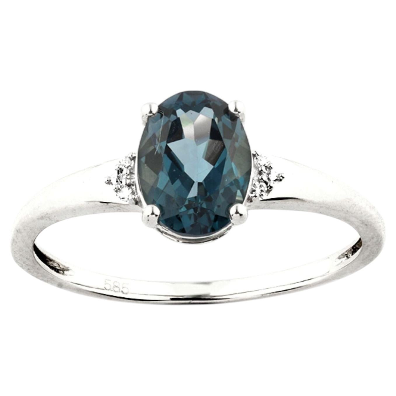 14K White Gold Oval & Round Cut Blue Topaz and Diamond Accent Ring