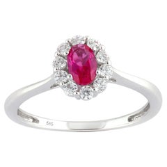 14K White Gold Oval Ruby And Round Diamond Halo Ring