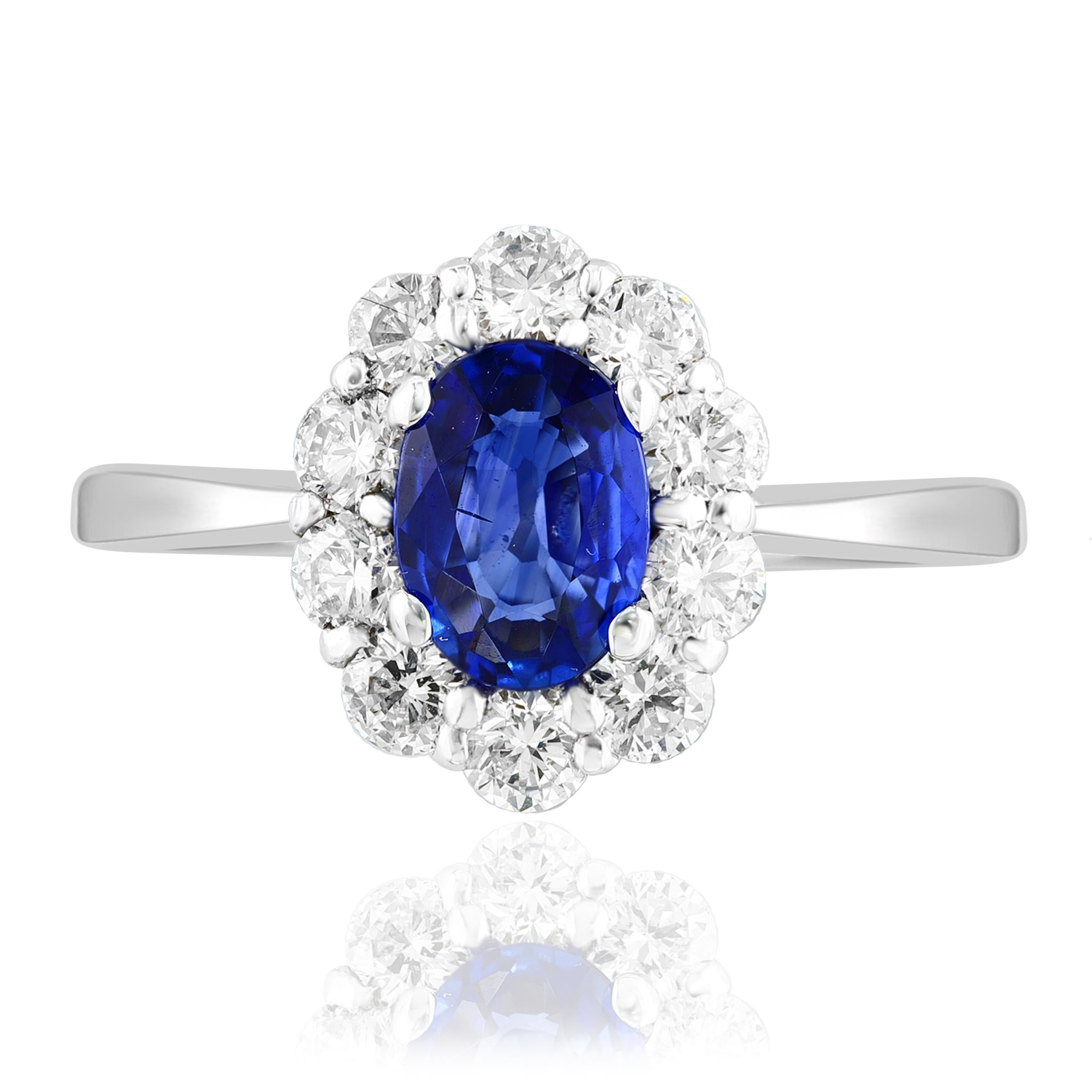 Oval Cut 14k white gold Oval Sapphire and diamond halo engagement ring For Sale