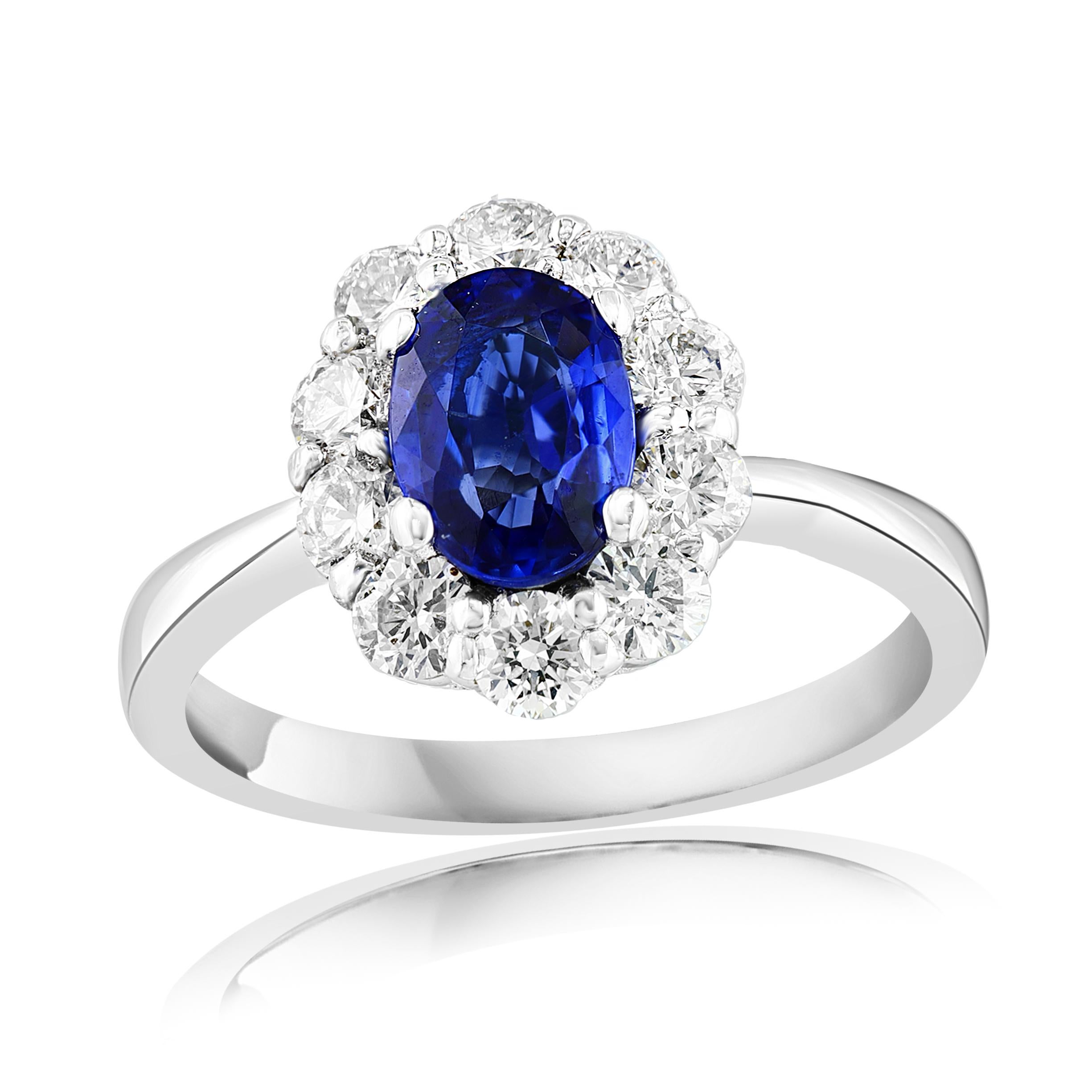 Women's or Men's 14k white gold Oval Sapphire and diamond halo engagement ring For Sale