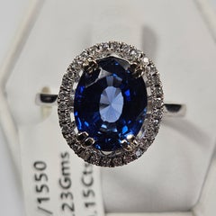 14k White Gold 3.65ct. Oval Sapphire 0.15ct Diamond Halo Ring (3.80Ctw)