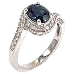 14K White Gold Oval Sapphire Halo Ring with Diamonds