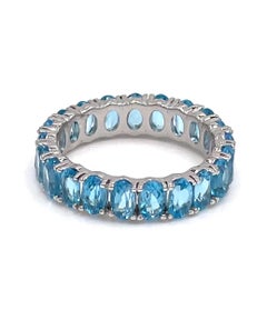 14K White Gold Oval Shape Sky Blue Topaz Eternity Ring