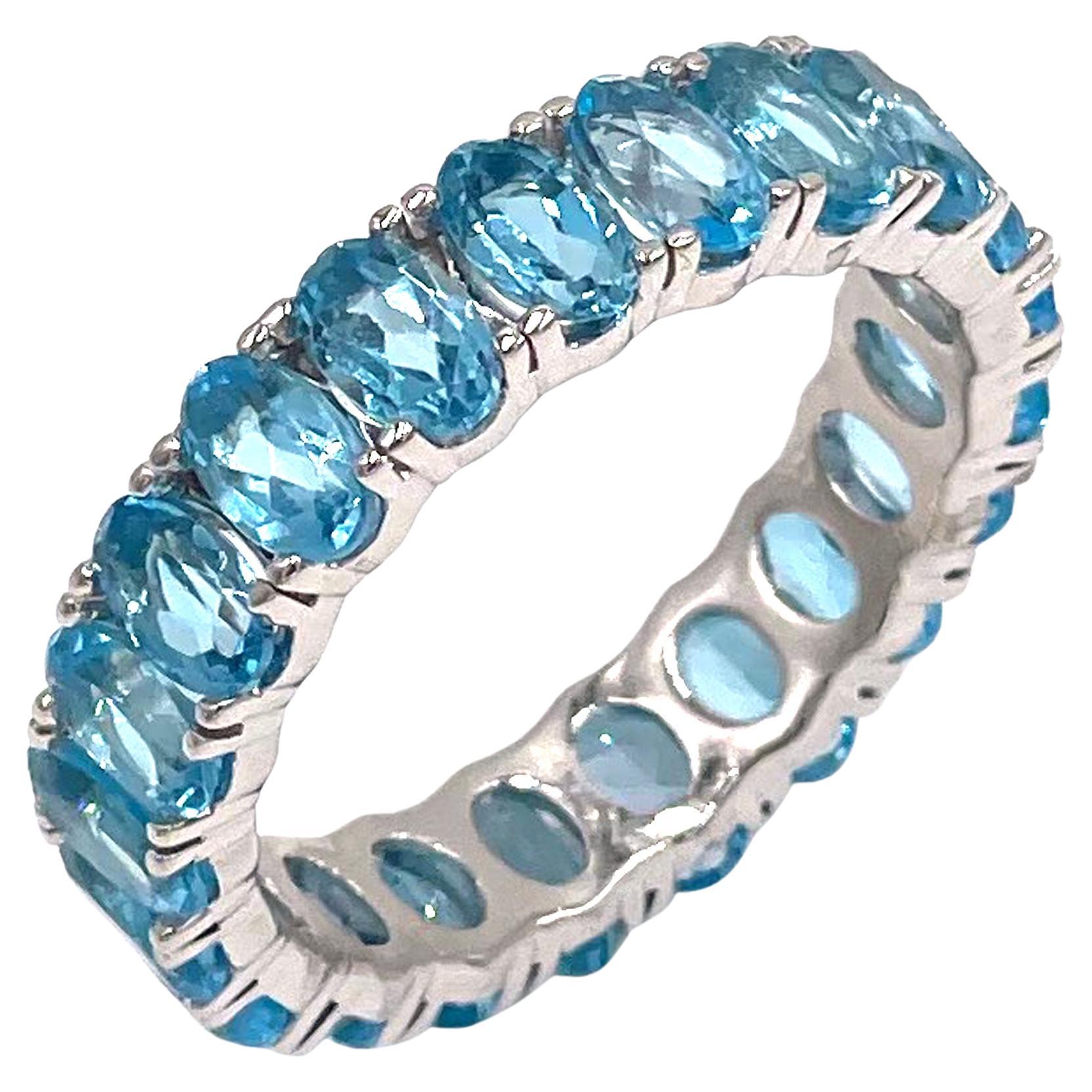14K White Gold Oval Shape Sky Blue Topaz Eternity Ring - 5.51 carats For Sale
