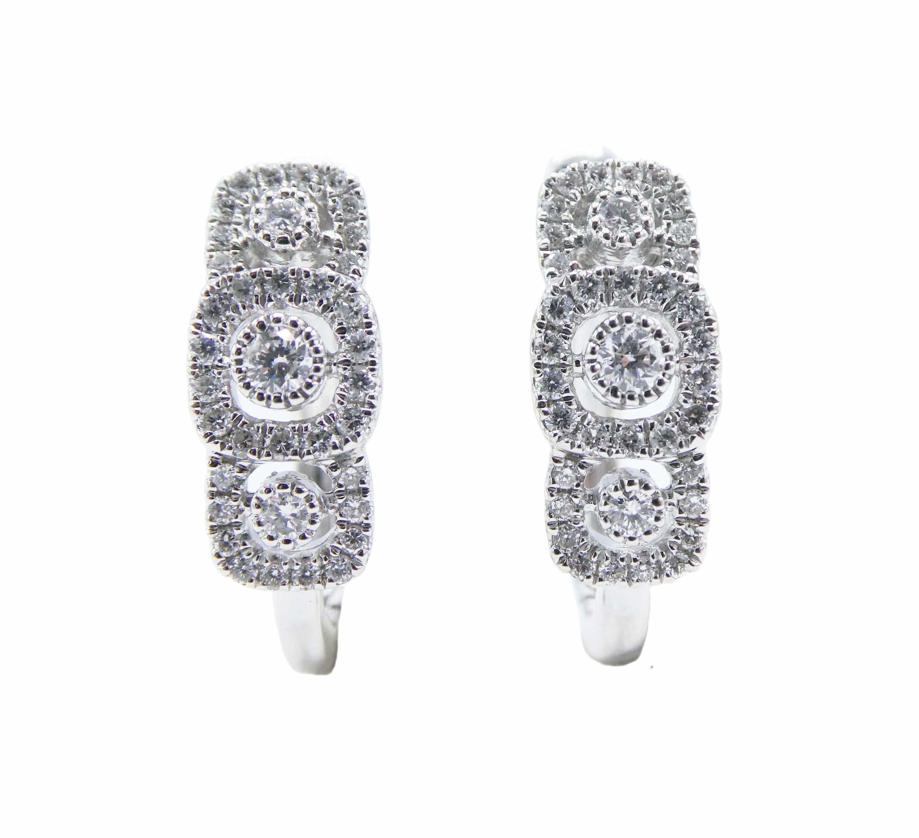 14K White Gold Pave Diamond Huggie Hoop Halo Earrings  0.35 CTW 

Metal: 14k White Gold
Weight: 3.57 grams
Diamonds: 74 RBC Approx. .35 CTW H-I SI 
Length: 14mm 
Width: 6mm