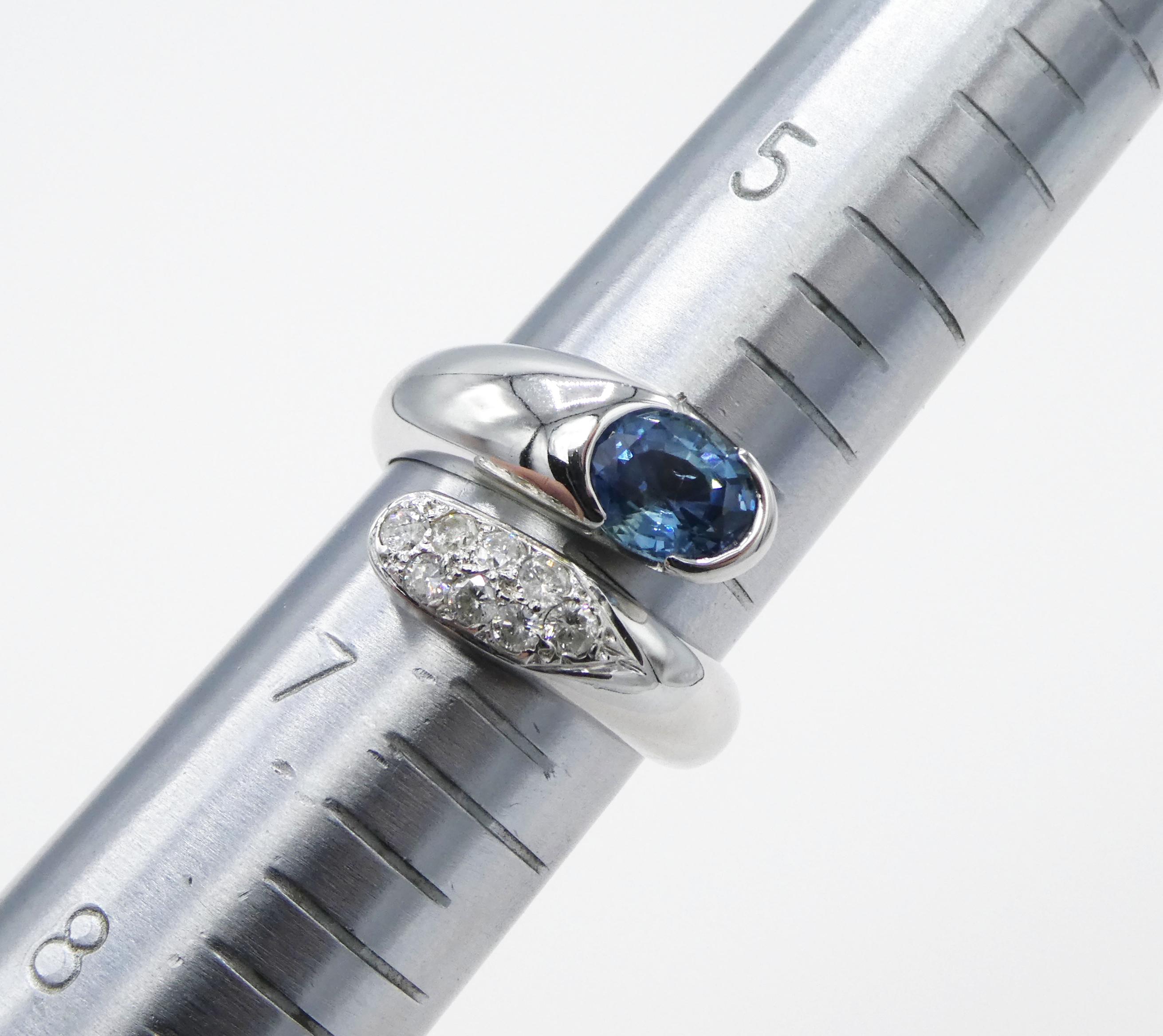 Women's or Men's 14 Karat White Gold Pave Diamond and Oval Blue Sapphire Bypass Cocktail Ring